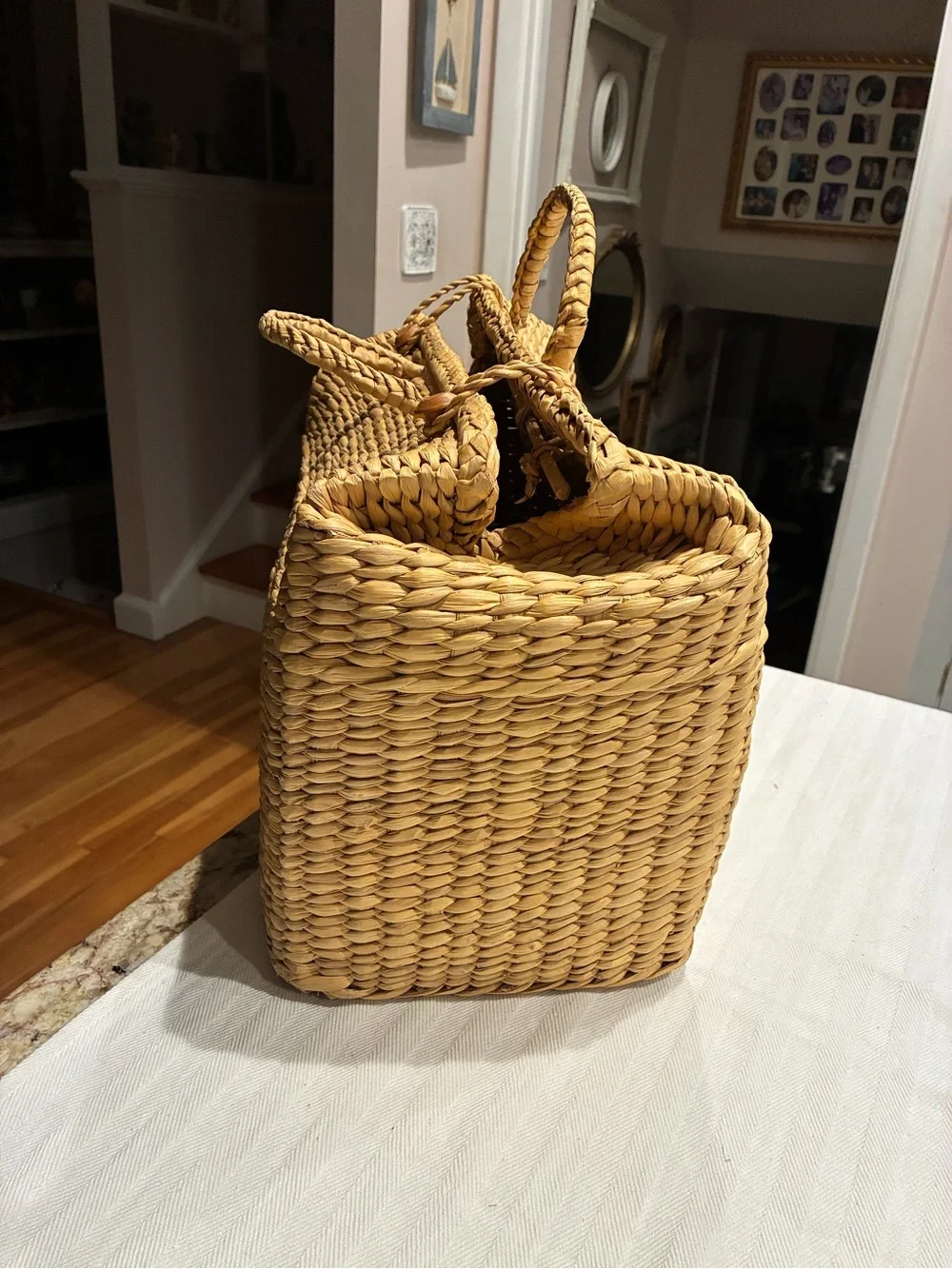 Vintage natural water hyacinth and reed structured picnic basket